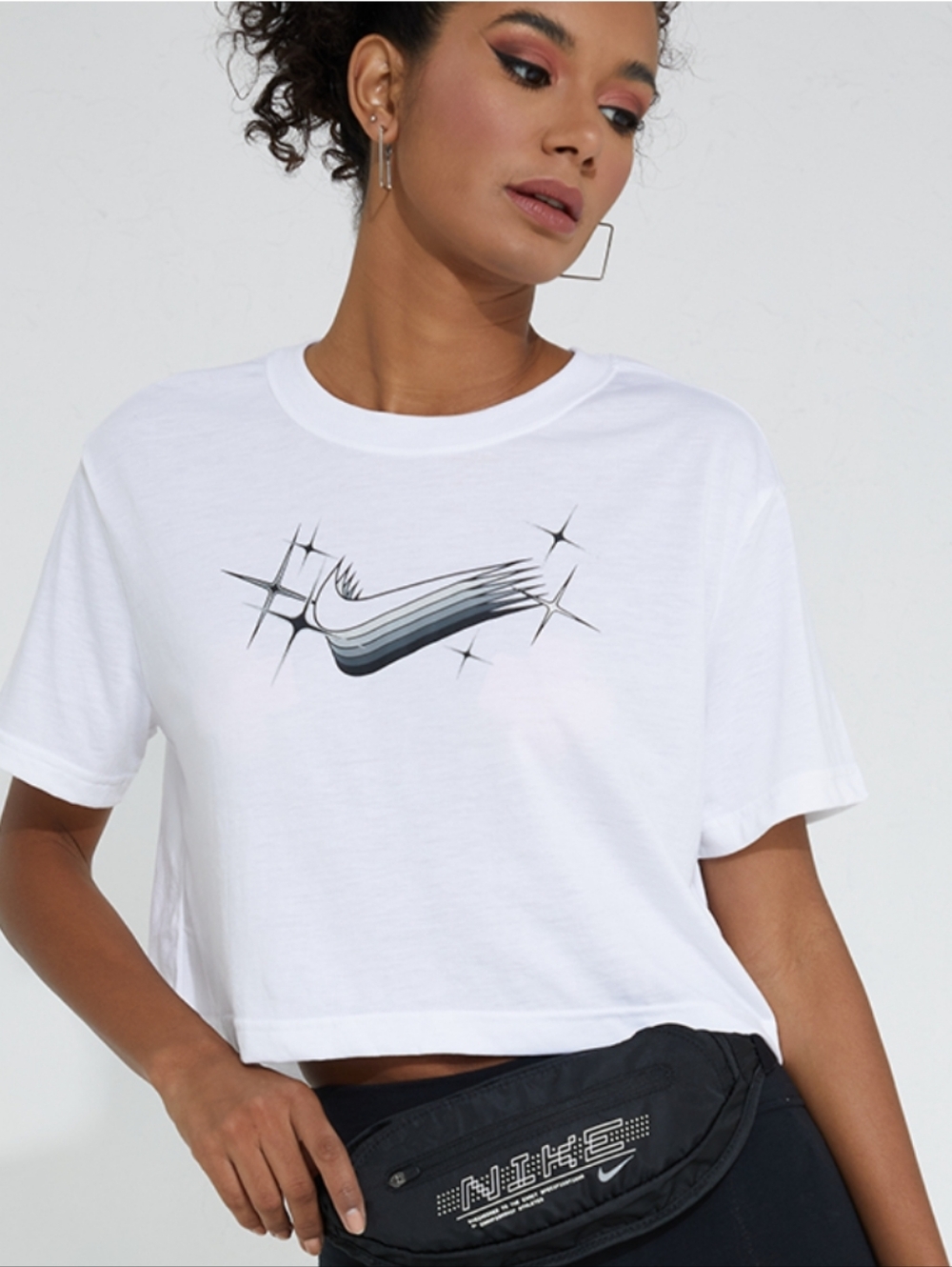 Nike White Cropped Graphic Tee with Metallic Sparkle Swoosh